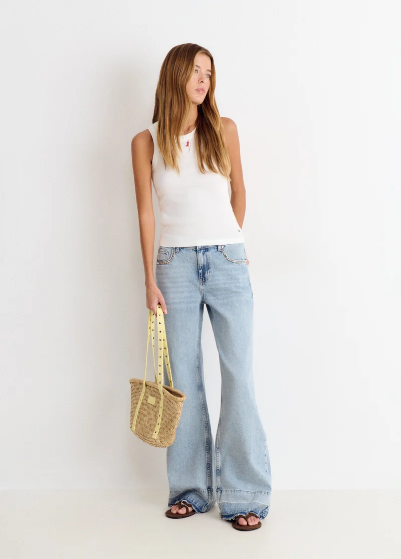 Jeans Relaxed Tachas Y Bajo