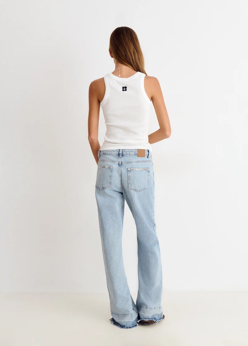 Jeans Relaxed Tachas Y Bajo